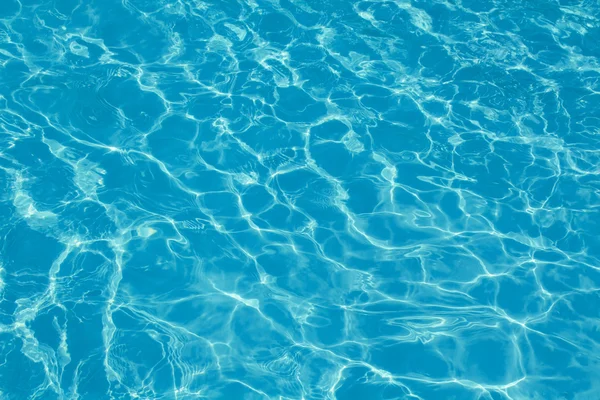 Textura fondo de agua de una piscina — Foto de Stock