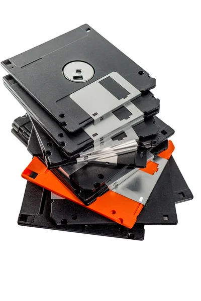 Only one orange floppy disk in row — Stock Photo, Image