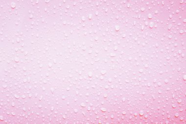 pembe doku üzerinde su damlaları