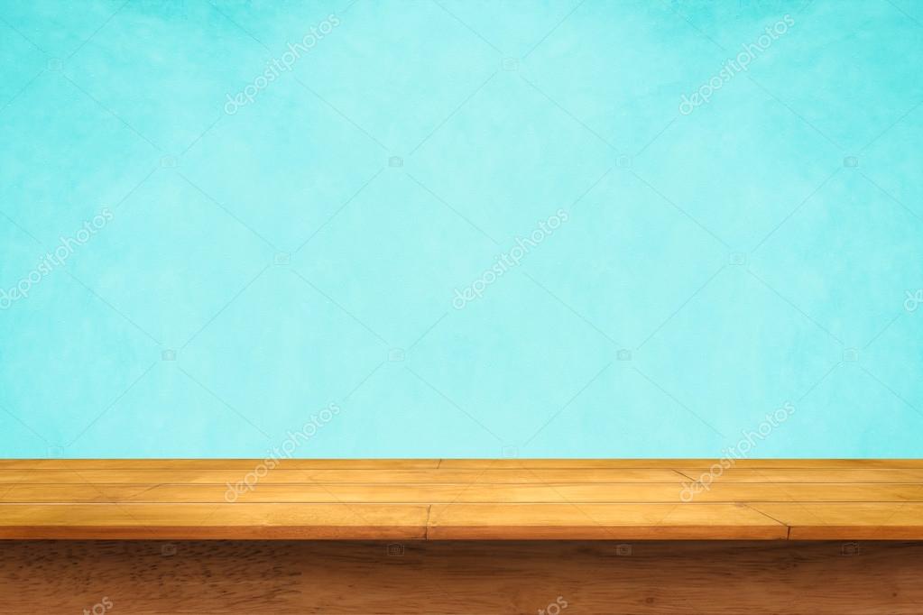 Empty top of wooden table on blue background. Stock Photo by ©jpkirakun  114836436