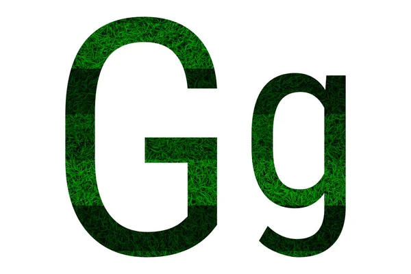 Engels alfabet met groen gras textuur. — Stockfoto