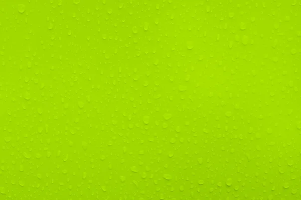 Gotas de água na textura verde — Fotografia de Stock