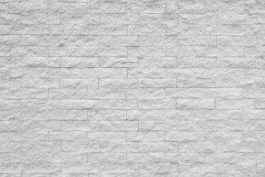 Doku ve arka plan beyaz tuğla duvar.