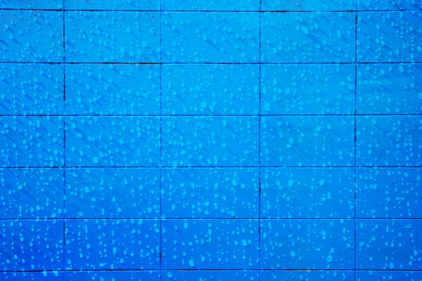 Blauwe betonnen blok muur naadloze achtergrond en textuur — Stockfoto