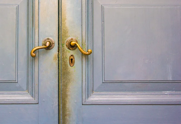 Closed and locked old door — Stock Photo, Image