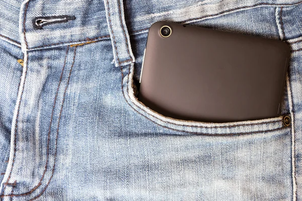 Tablet ve kot pantolon