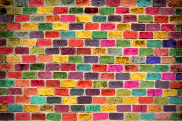 Arcobaleno colorato muro di mattoni — Foto Stock