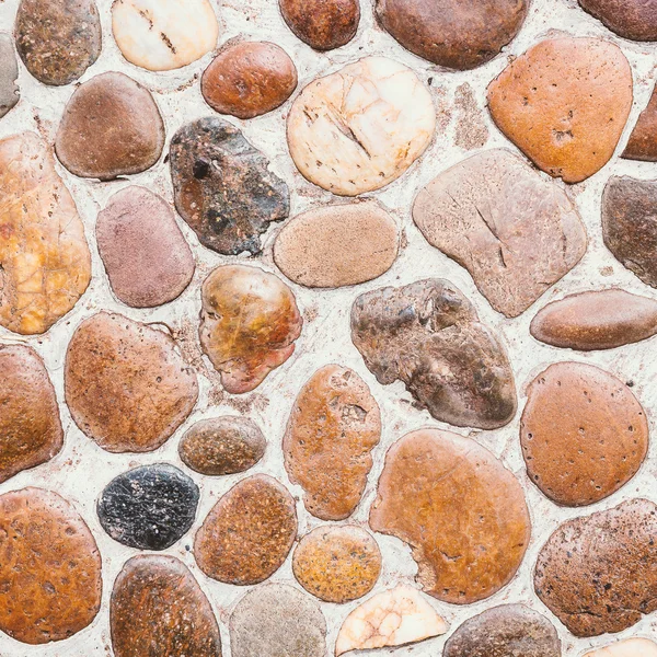 Текстура плитки галькової кам'яної підлоги — стокове фото