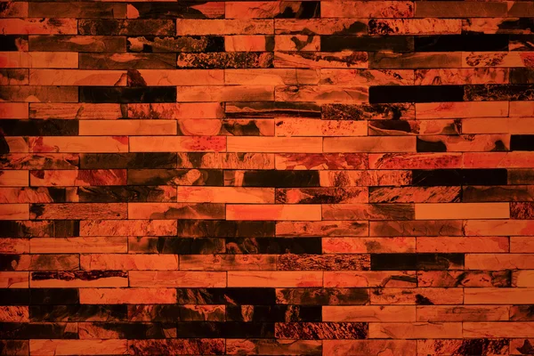 Muro di mattoni arancione e nero — Foto Stock