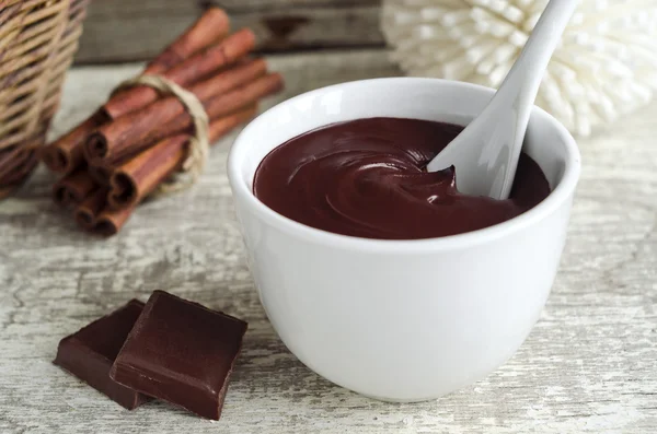 Cocoa (dark chocolate) face and body mask in a bowl — Stock Photo, Image