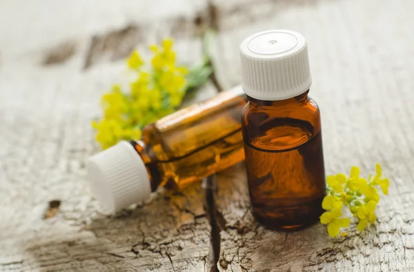 Two small  bottles of natural cosmetic (essential) aroma oil — Stock Photo, Image