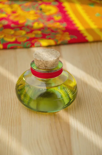 Oil in a little bottle — Stock Photo, Image