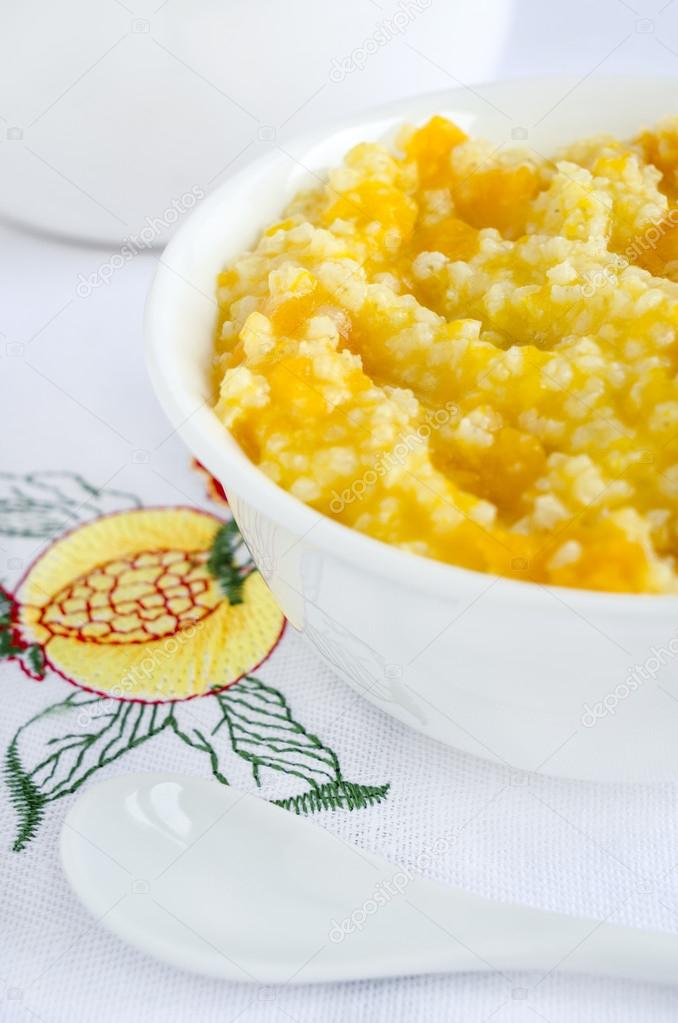 Millet porridge with pumpkin — Stock Photo © Kazmulka 57731669