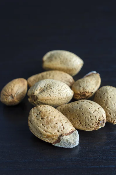 Umpeeled almonds close up — Stock Photo, Image