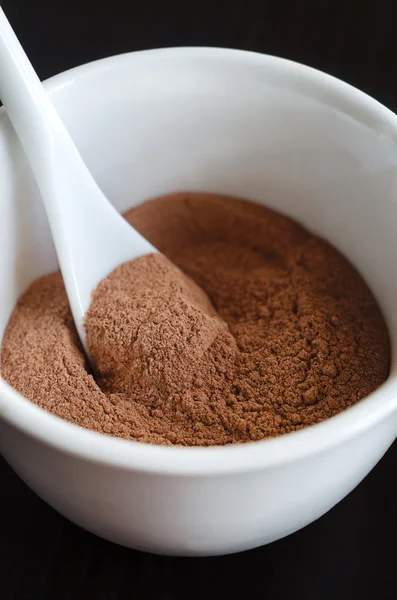 Red cosmetic clay in a bowl — Stock Photo, Image