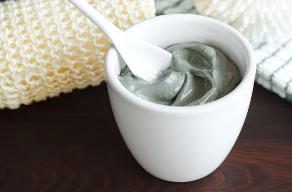 Grey cosmetic clay in a bowl — Stock Photo, Image