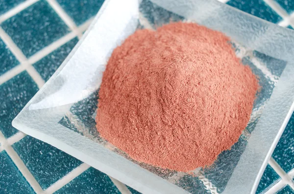 Red cosmetic clay powder — Stock Photo, Image