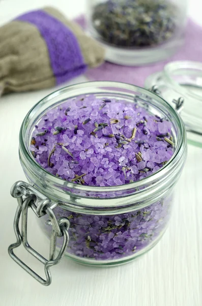 Bath salt with lavender extract and dried lavender Stock Image