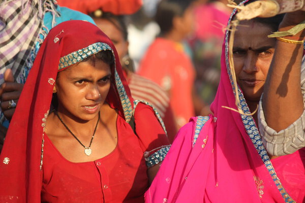 Indian girls with traditional colored saree