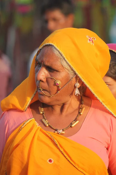 Senior Indian woman with yellow veil — Stock Photo, Image
