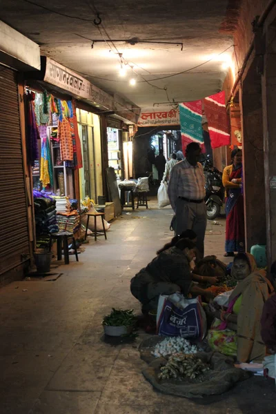 Indian souq at night, with people working — Stock Photo, Image