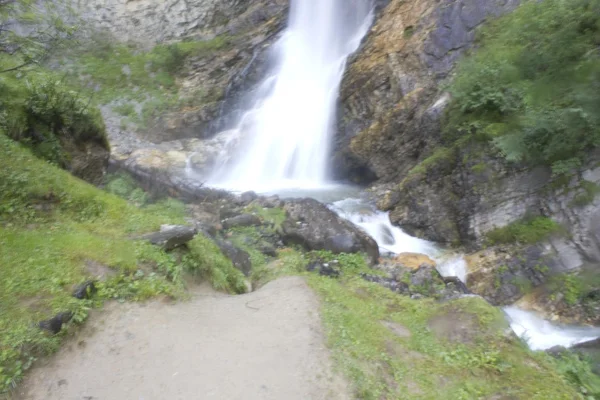 Waterfall through rocks — Stock Photo, Image