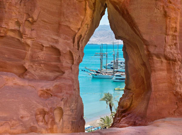 Eilat seen through the sandstone arch