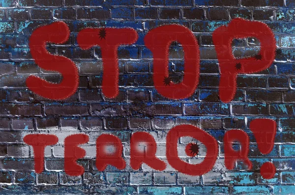スローガン「停止 te と落書き壁の碑文 — ストック写真
