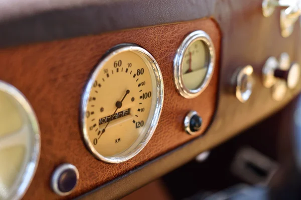 Retro car dashboard with gauges — Stock Photo, Image