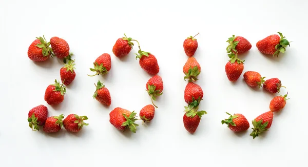 2015, obsažené v jahody (novoroční karta - koncepce) — Stock fotografie