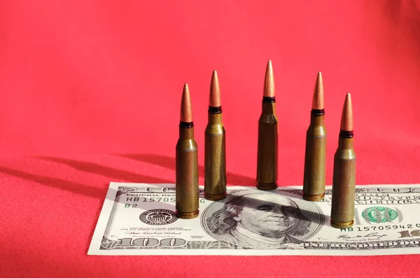 Bullets on dollar bills (terrorism, war, Ukraine, armed conflict — Stock Photo, Image