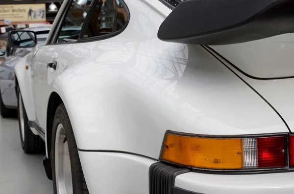 Old white sports car. Rear view. — Stok fotoğraf