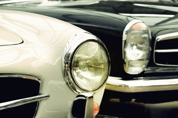 Headlights old cars in vintage style (good and evil, genesis, an — Stock Photo, Image