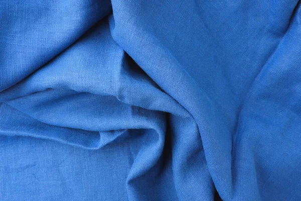 Tekstil, kumaş mavisi pamuk güzel bir dalga gibi görünüyor, lüks görünüyor, arka plan, desen. Soyut arkaplan boş şablon, üst görünüm.