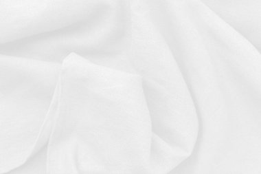 Soyut arka plan lüks beyaz kumaş denizdeki aynı sıvı dalgaya benziyor. Pamuğun dokusu arka plan veya duvar kağıdı tasarımı için lüks, arkaplan.