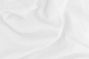 Soyut arka plan lüks beyaz kumaş denizdeki aynı sıvı dalgaya benziyor. Pamuğun dokusu arka plan veya duvar kağıdı tasarımı için lüks, arkaplan.