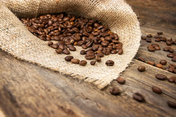 Coffee beans on wood background Stock Photo