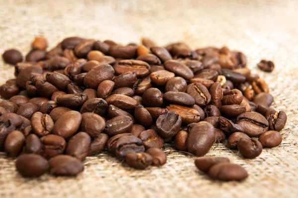 Coffee beans on wood background Stock Photo