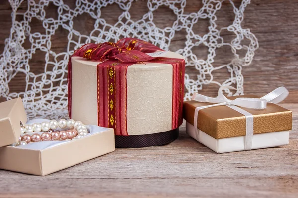 Gift boxes on a wooden background — Stock Photo, Image