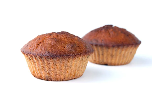 Muffins beyaz zemin üzerine — Stok fotoğraf