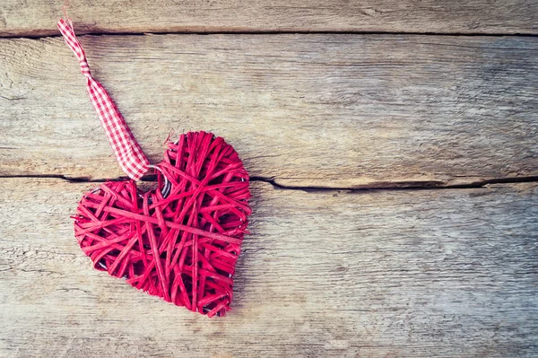 Red heart on a wooden background — Stock Photo, Image