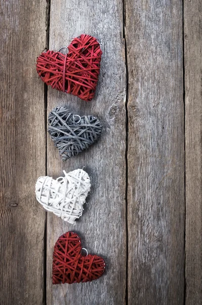 Heart on a wooden background. Vintage style. — Stock Photo, Image