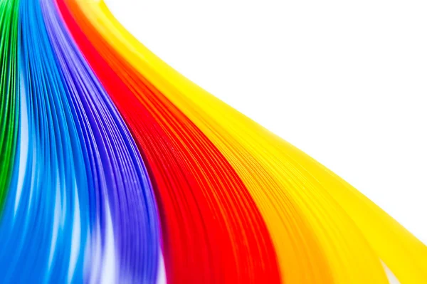 Papel quilling colorido arco-íris dispostos em ondas e formas — Fotografia de Stock