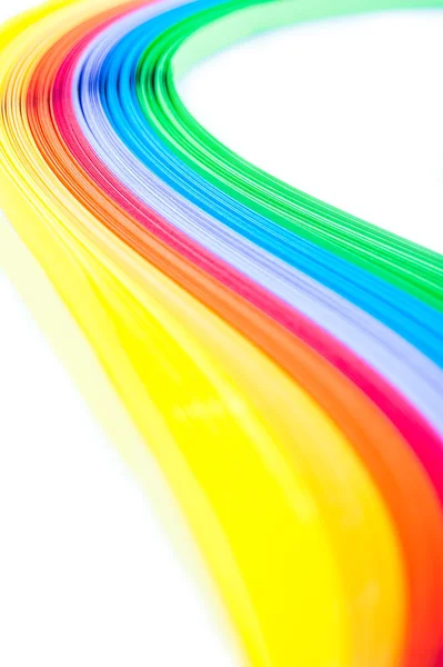 Papel de molienda de color arco iris presentado en ondas y formas — Foto de Stock