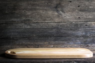 ahşap arka plan üzerinde kesme tahtası