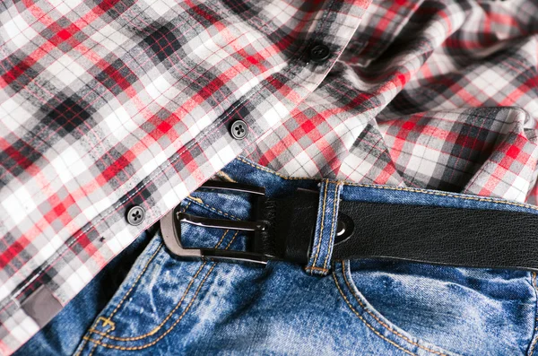 格子縞のシャツとジーンズのペア。様式化されたヴィンテージ. — ストック写真