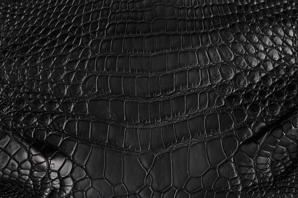 Abstract achtergrond van naadloze krokodil zwart lederen textuur — Stockfoto