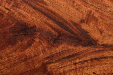 Koyu kahverengi ahşap yüzeyin soyut arka planı. Sanat eserleri için üst görünümü kapat.