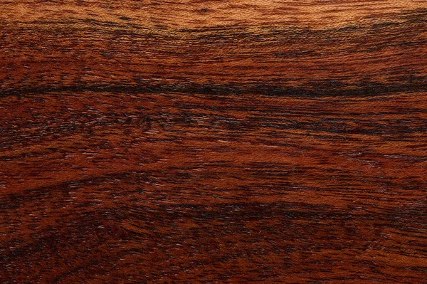 Abstraktní pozadí tmavohnědého dřevěného povrchu. Detailní pohled shora pro umělecká díla. — Stock fotografie