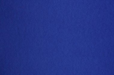 Lekesiz koyu mavi kağıt dokusuna yakın çekim